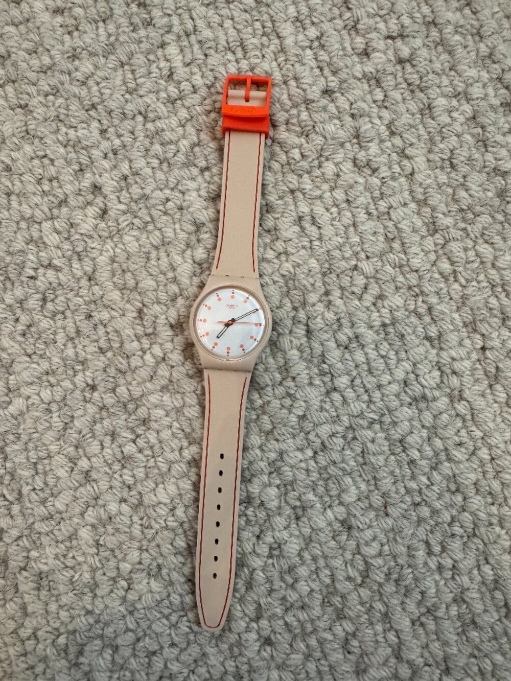 swatch watch, tan